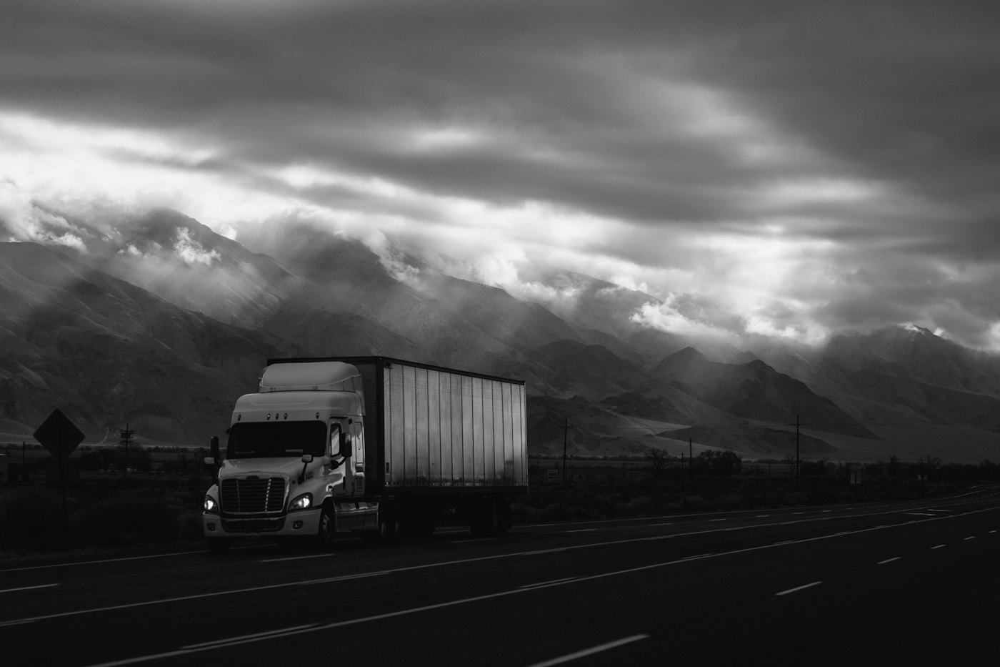 White tractor-trailer on the highway